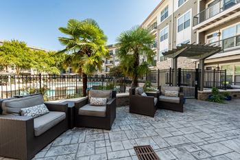 Poolside lounge at the tribute apartments in raleigh, nc 27612